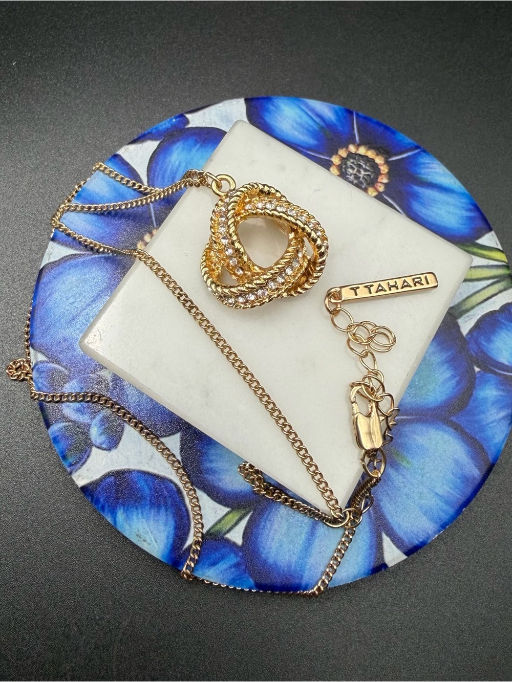 T Tahari knot and crystal pendant necklace #576 gold tone